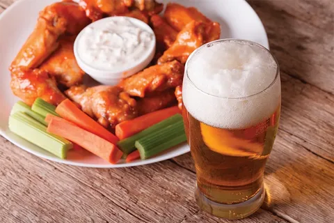 The Secret to Why Wings Pair Well with Ranch and Beer